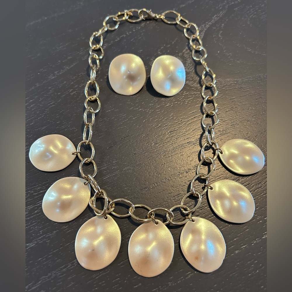 Statement necklace iridescent cream disks on gold chain with pierced earrings